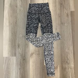 Black and white crackle patterned Lululemon leggings.